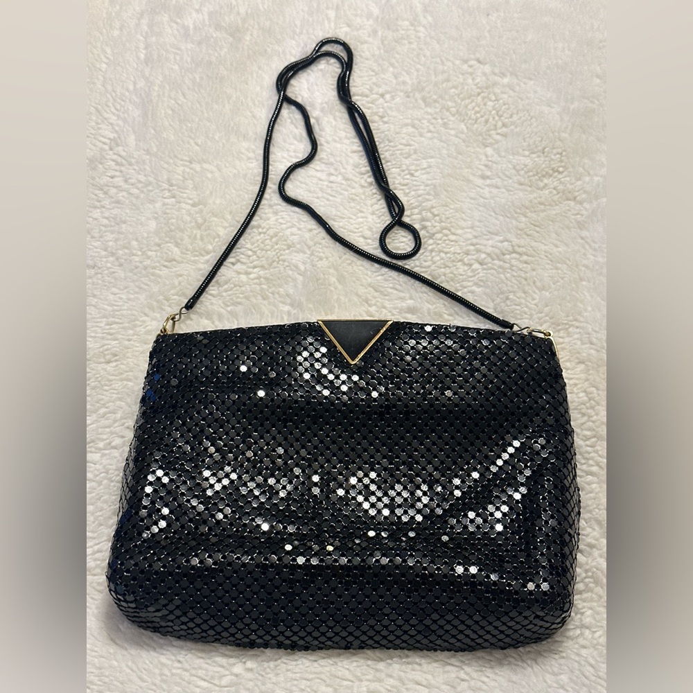 Elka Metal Mesh Clutch with metal chain shoulder strap.